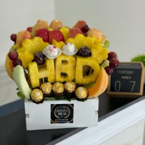 16" Edible Arrangement with Carvings and Ferrero Rocher